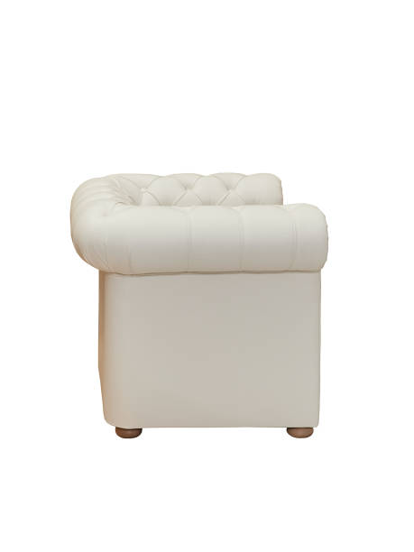 istock retro beige leather comfortable armchair isolated on white background, side view 1419011527
