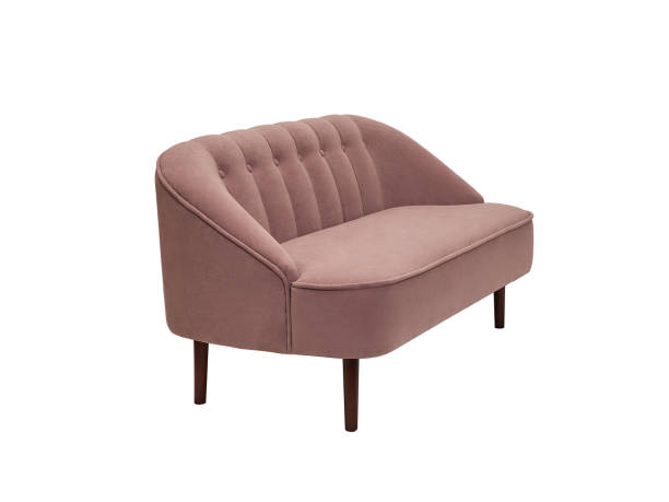 istock vintage pink fabric sofa isolated on white background, side view. retro couch 1419011940
