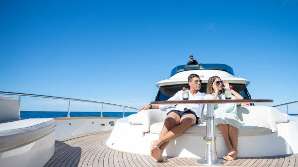 istock Couple sitting on yacht 1419016025