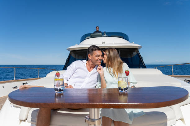 istock Couple sitting on yacht 1419016053