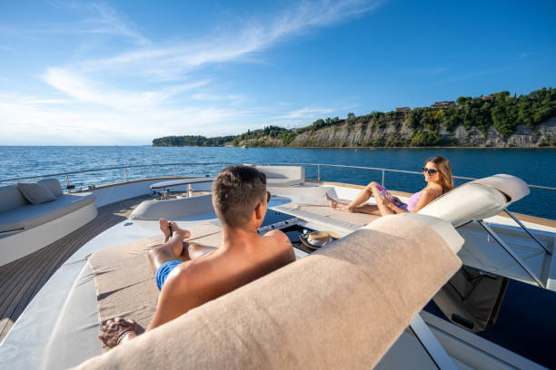 istock Couple relaxing on luxury yacht 1419016071