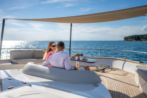 istock Couple relaxing on luxury yacht 1419016086