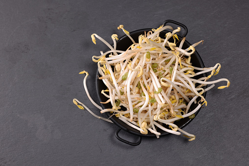 Fresh Bean sprouts prior to cooking. High resolution image 45Mp taken with Canon EOS R5 and f2.8 Macro lens