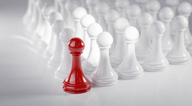 istock Leadership Concept Red Pawn Chess Leading White Pawn Formation 3D Render 1419023679