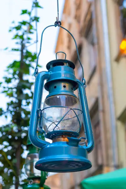 Old blue gas lamp on the street.