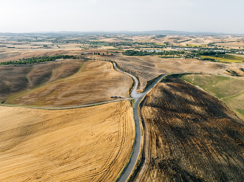 Aerial view of landscape in Tuscany, Italy. Plowed wheat fields.