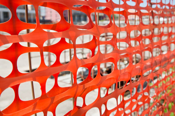 istock Plastic safety grid in construction site areas to delimit construction activities 1419024854