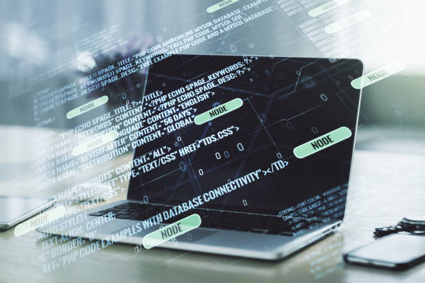 istock Double exposure of abstract programming language on laptop background, research and development concept 1419026111