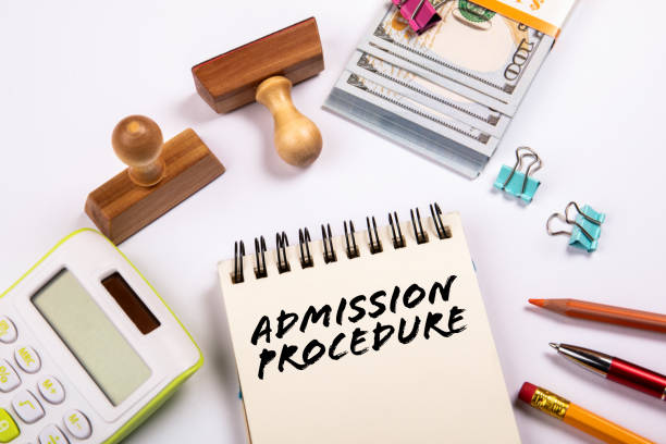 istock Admission Procedure text written on a notebook. Money, calculator on white office table 1419026677