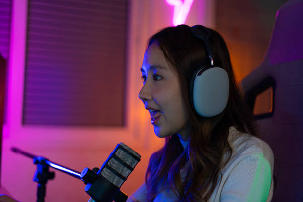 istock Asian gamer playing online video game winning excited on PC with lighting effect, broadcast streaming live at home. Gamer and E-Sport online gaming technology Championship tournament gamer concept. 1419028176