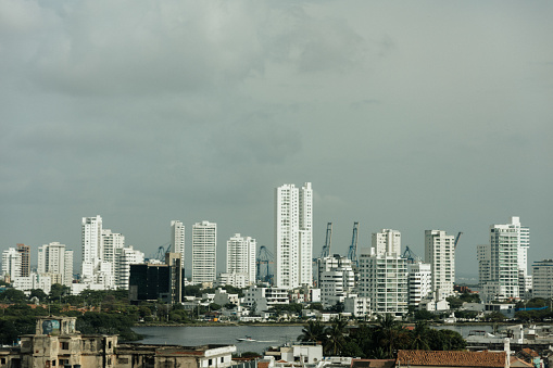 View of Cartagena from a terrace. There are several new buildings on the horizon.