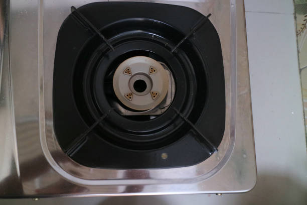 istock black square placemats on the gas stove 1419033303