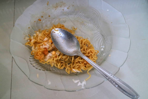 istock brown curly noodles on a clear glass plate 1419033571