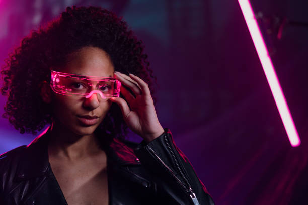 istock Metaverse digital cyber world technology, woman with smart goggles playing augmented reality game, futuristic lifestyle 1419033591