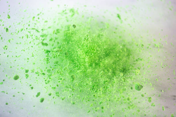 colorful powder explode on white background captured in high speed