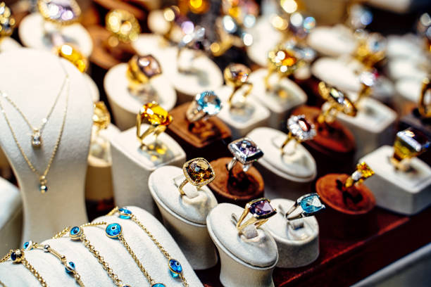 Rings, earrings, bracelets and other for sale, Grand Bazaar, Istanbul, Turkey Shop window with jewellers and gold bracelets, Grand Bazaar, Istanbul, Turkey costume jewelry stock pictures, royalty-free photos & images