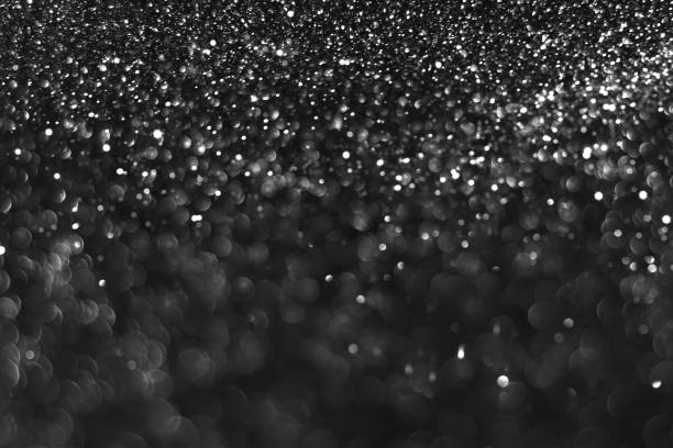 istock Gray black sparkling glitter bokeh background 1419039808
