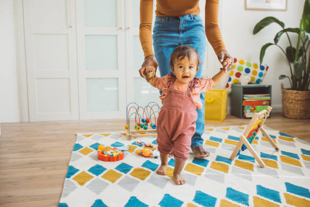 istock Young mother with baby at home 1419042307