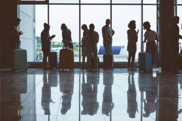 istock Passengers waiting at airport terminal 1419042849