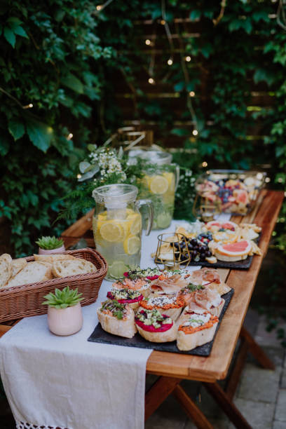 istock Dessert buffet at small wedding reception outside in the backyard. 1419045913