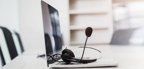 istock Communication support, call center and customer service help desk. VOIP headset for customer service support (call center) concept . 1419046248