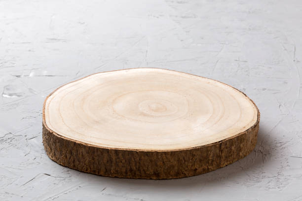 istock Perspective view of wooden serving tray on cement background. Empty space for your design 1419047232