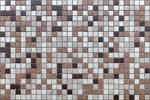 Grey and brown mosaic wall texture and background