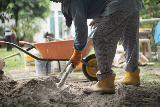 istock Asian worker mixing cement on the work site 1419052240