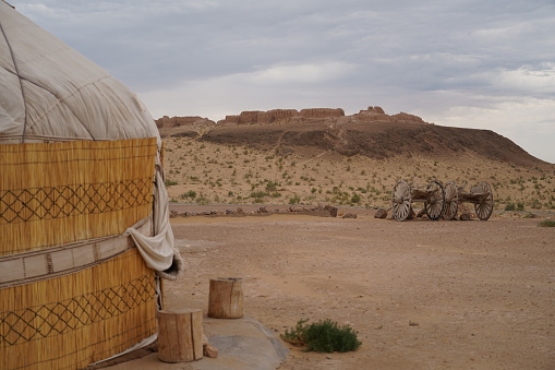 Native American indigenous people decorated Puebloan teepee up close.