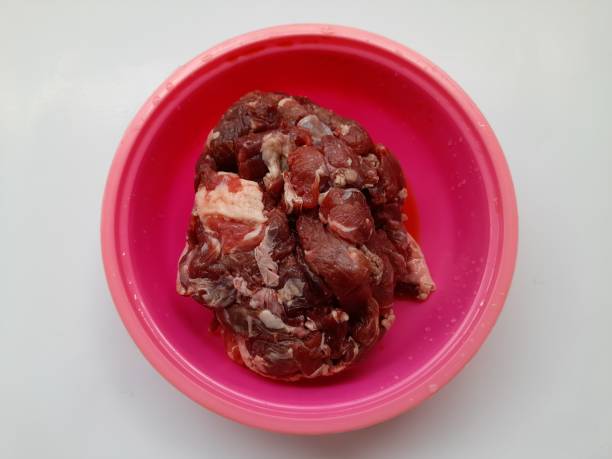 Raw beef seen from above in a bowl