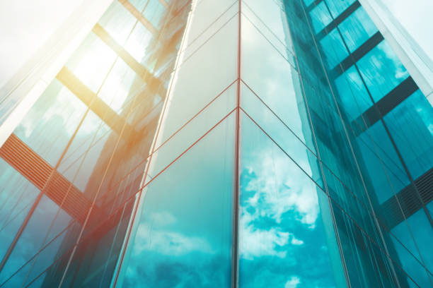 istock underside panoramic and perspective view to steel blue glass high rise building skyscrapers 1419062142