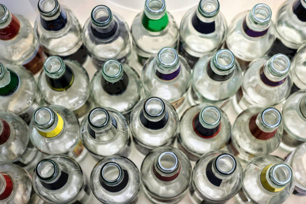 istock Rows of empty beer bottles seen in closeup 1419068294