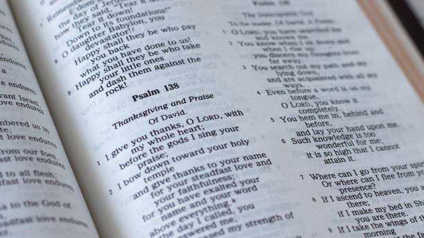 istock Psalm 138 verses in an open Holy Bible Book, a closeup 1419068658