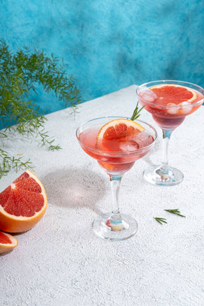 istock Summer refreshing sparkling cocktails with grapefruit. Lemonade garnished with fresh rosemary. Summer beverage with sparkling water and grapefruit slices. 1419074281