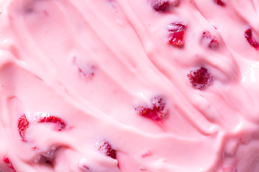 Texture Strawberry Yogurt,Close up homemade pink creamy blueberry or strawberry yogurt texture background.