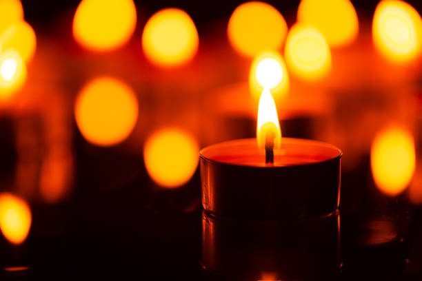 istock Macro candle,Burning candles on dark background 1419075039