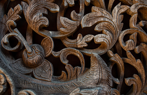 wood carving,A plank of old carved wood from an old Zanzibar door in Stone town Zanzibar sold to tourist in Antique shops.