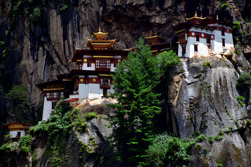 Bhutan: Tiger's Nest - Paro Taktsang / Taktsang Palphug monastery - sacred Vajrayana Himalayan Buddhist site located on a steep rock face about 900 m above the Paro valley floor - dedicated to Padmasambhava, aka Guru mTshan-brgyad Lhakhang or \