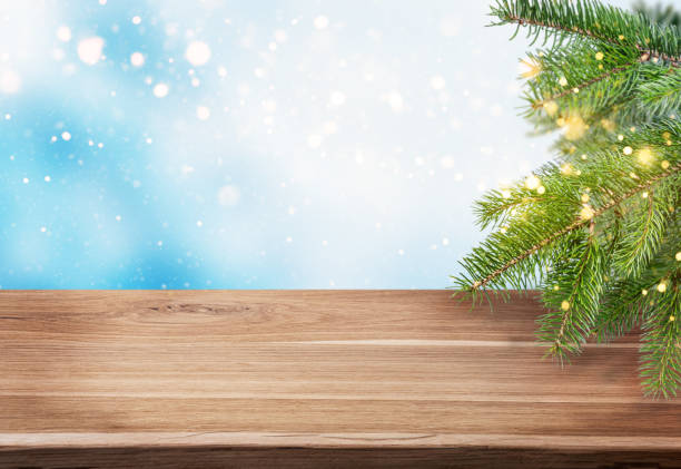 istock Winter or christmas background with wood table and christmas tree. 1419079523