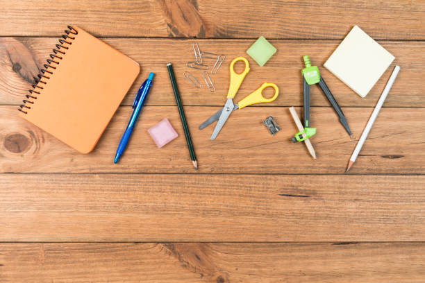 istock School supplies on some wooden boards 1419081101