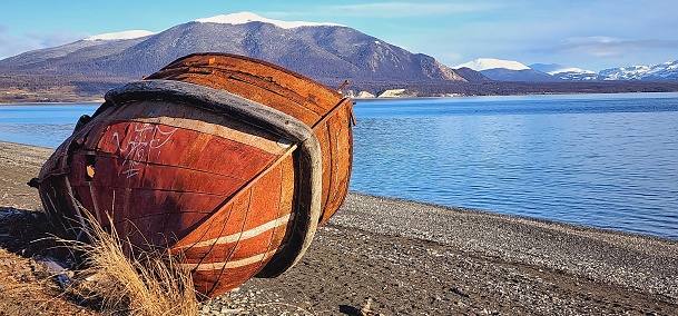 wooden  boat  stranded  on  the  beach