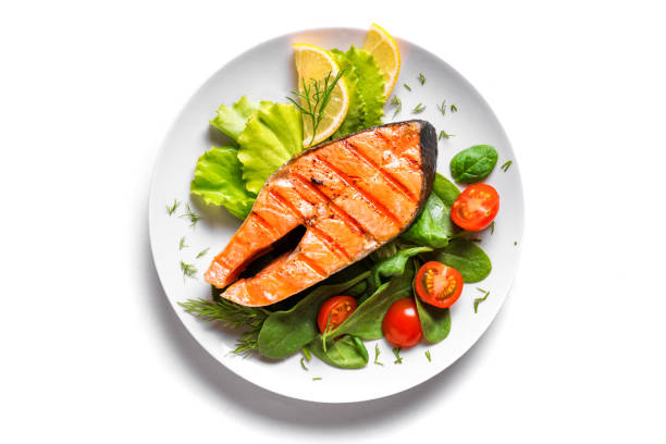 istock Grilled salmon steak with vegetable salad 1419081513