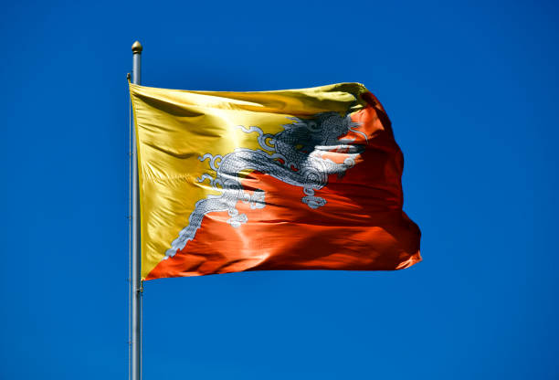 istock Flag of Bhutan in the wind (actual photo, not CGI) 1419081743