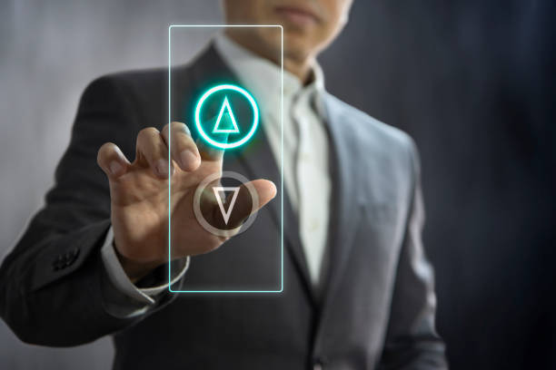 Next Level Up to a Success Business administrator pressing the virtual elevator button for next levels up in concept of more advance to a success. hand elevator stock pictures, royalty-free photos & images