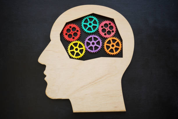 istock Head shape and colorful gears inside. Mental health concept. 1419087163