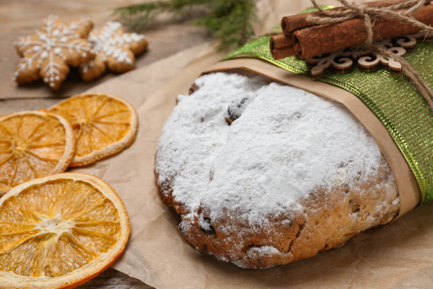istock Decorated traditional Christmas Stollen on table, closeup 1419087526
