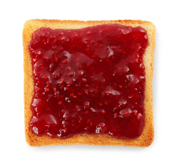 istock Toast with tasty raspberry jam on white background, top view 1419088291