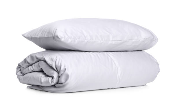 istock Stylish silky bed linens and pillow on white background 1419089194