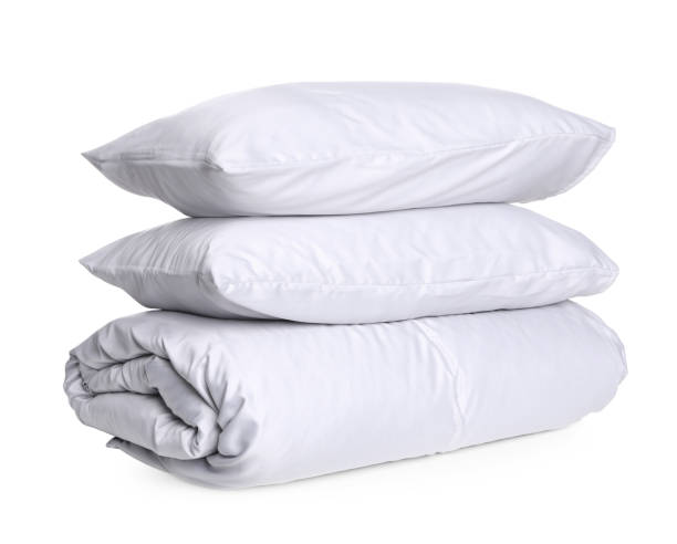 istock Stylish silky bed linens and pillows on white background 1419089199