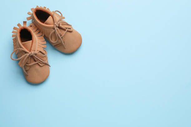 Running children's shoes with flying laces isolated on white background.